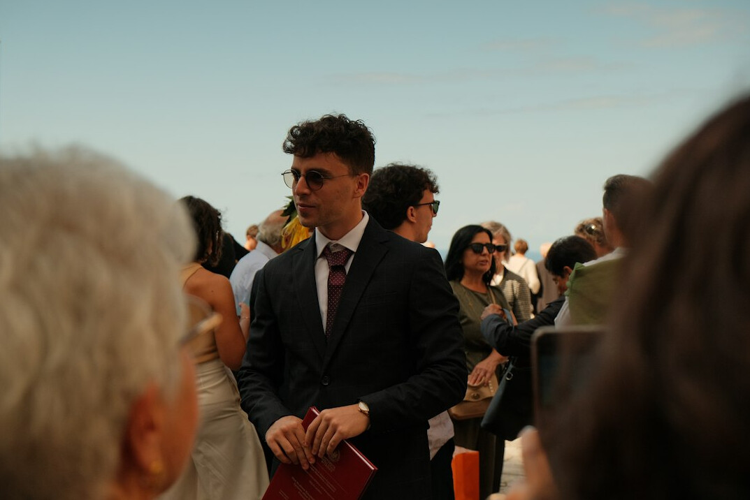 Red carpet event with photographers and elegant guests